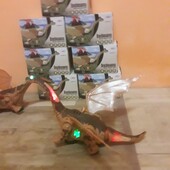 Супер подарок - большой динозавр с крыльями 35 см, ходит, музыка, свет