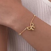 Браслет підвіска бантик, бант. Медсталь, позолота 18к