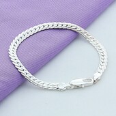 Серебряный браслет 925 пробы. Длина 18 см, ширина 5 мм.