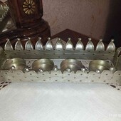 Металевий підсвічник на чотири свічки