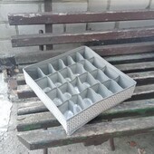 Органайзер/короб для хранения с ячейками.