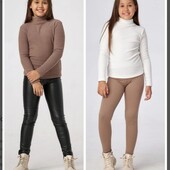 В сезон буде дорожче! Класний гольфик молочного кольору в рубчик р. 146 - 158! Стан нового!