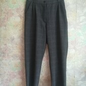 Стильні штани в клітинку.