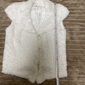 Білий хутряний желет