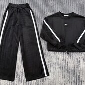 Крутезний костюм, теплий! 134 як новий.