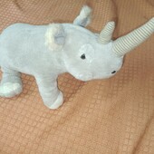 Прикольный носорог. Мягуська с шариками в ногах.