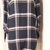 Симпатична сукня в клітку