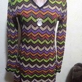 Туника L розміру,в грудях 102 см.