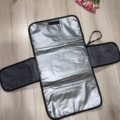 Портативна сумка-килимок для сповивання.