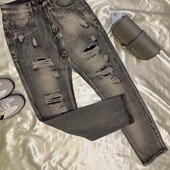 Трендові джинси сірого кольору (є підклад під рваностями)