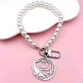 Брелок, брелока на карабіні, біле намисто, підвіска риба, кит, кашалот. Медсталь