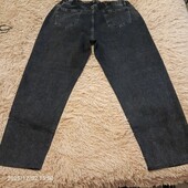 Джинсові штани з камінчиками з переді.