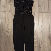 Комбинезон трикотажный с паетками 10-12 лет.