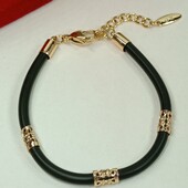 Красивый каучуковый браслет с позолоченными вставками, 18-21 см. Позолота 585 пробы 18К.