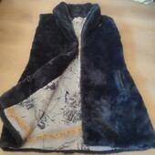 Жилетка жіноча тепла