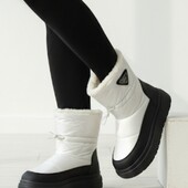 Зимові черевики, що гріють стиль так само, як і ноги.