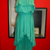 Смарагдова зелена сукня з подовженою спідницею