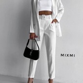 Новий білосніжний брючний костюм. р. 44-46