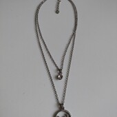 Подвійна цепочка з кулонами. Стан нової