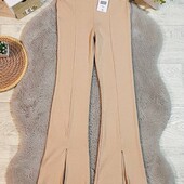 Стильні брючкі з розрізами кльош рубчик, нові Сток