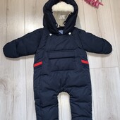 Новий стан.Зимовий комбінезон з шапкою ,на зріст 68см.