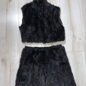 В ідеалі комплект з норки на зріст 128-140см.