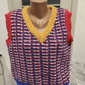 Теплий в'язаний жилет