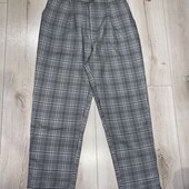 У відмінному стані штанці з кишенями,по спинці на резинці.
