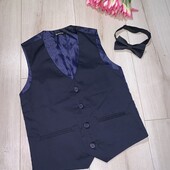 В ідеалі.Жилет з метеликом на 8років.