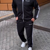 Чоловічі спортивні костюми.