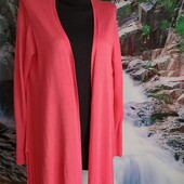 Трикотажний кардиган на пишні форми в персикових відтінках.