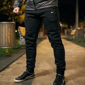 Фірмові спортивні штани чоловічі з тринитки на флісі утеплені Nike чорні
